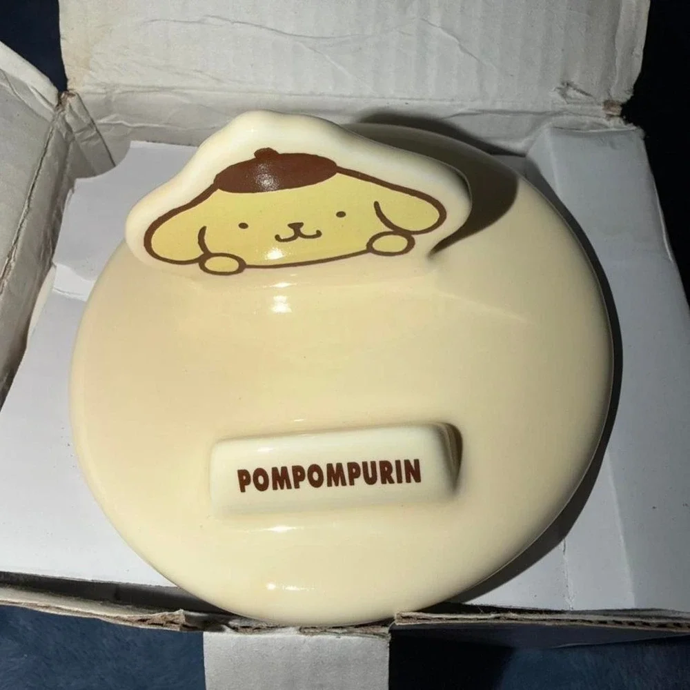 Pompompurin phone stand mug
